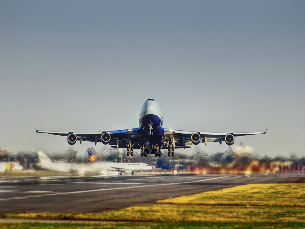 Airplane taking off on the runway of an airport