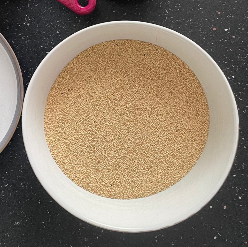 White bowl with amaranth seeds