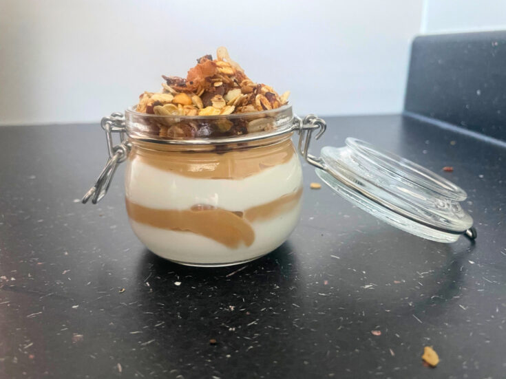 Coconut sugar cream cheese yogurt pot with homemade stovetop granola in a glass pot with a lid