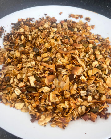 arial view of Homemade stovetop Granola on white plate