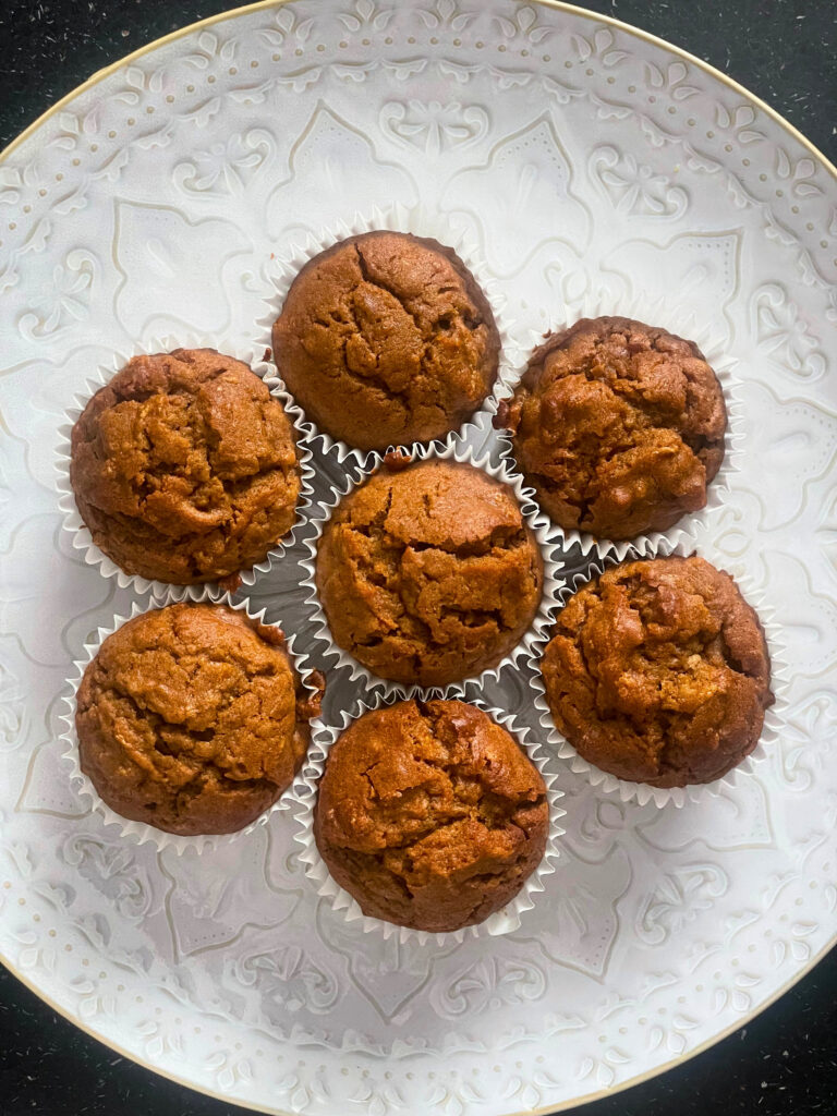 7 Carrot cake muffins on a decorative plate