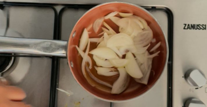 Onions in pot with olive oil