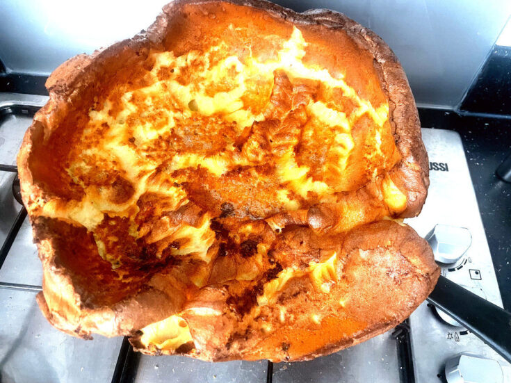 puffed dutch baby pastry straight out of the oven